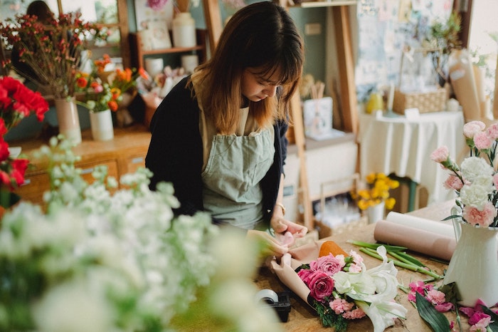 retail employee in flower shop
